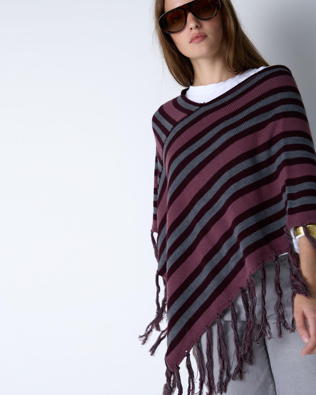 PONCHO RAYAS FLECOS