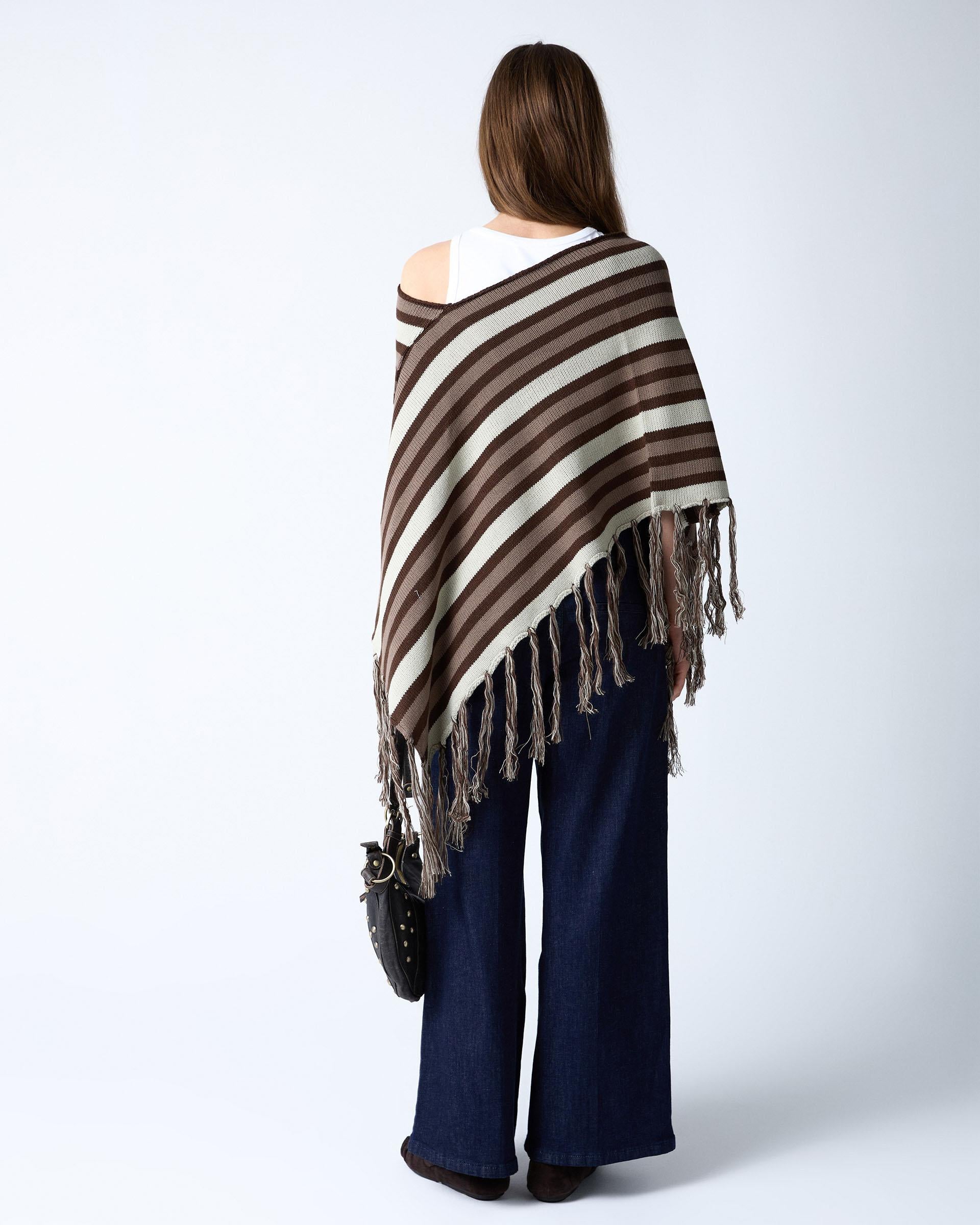 PONCHO RAYAS FLECOS
