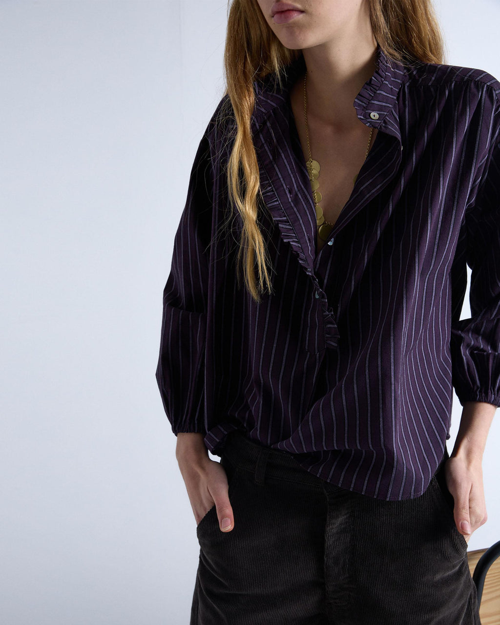 BLUSA RAYAS VOLANTE