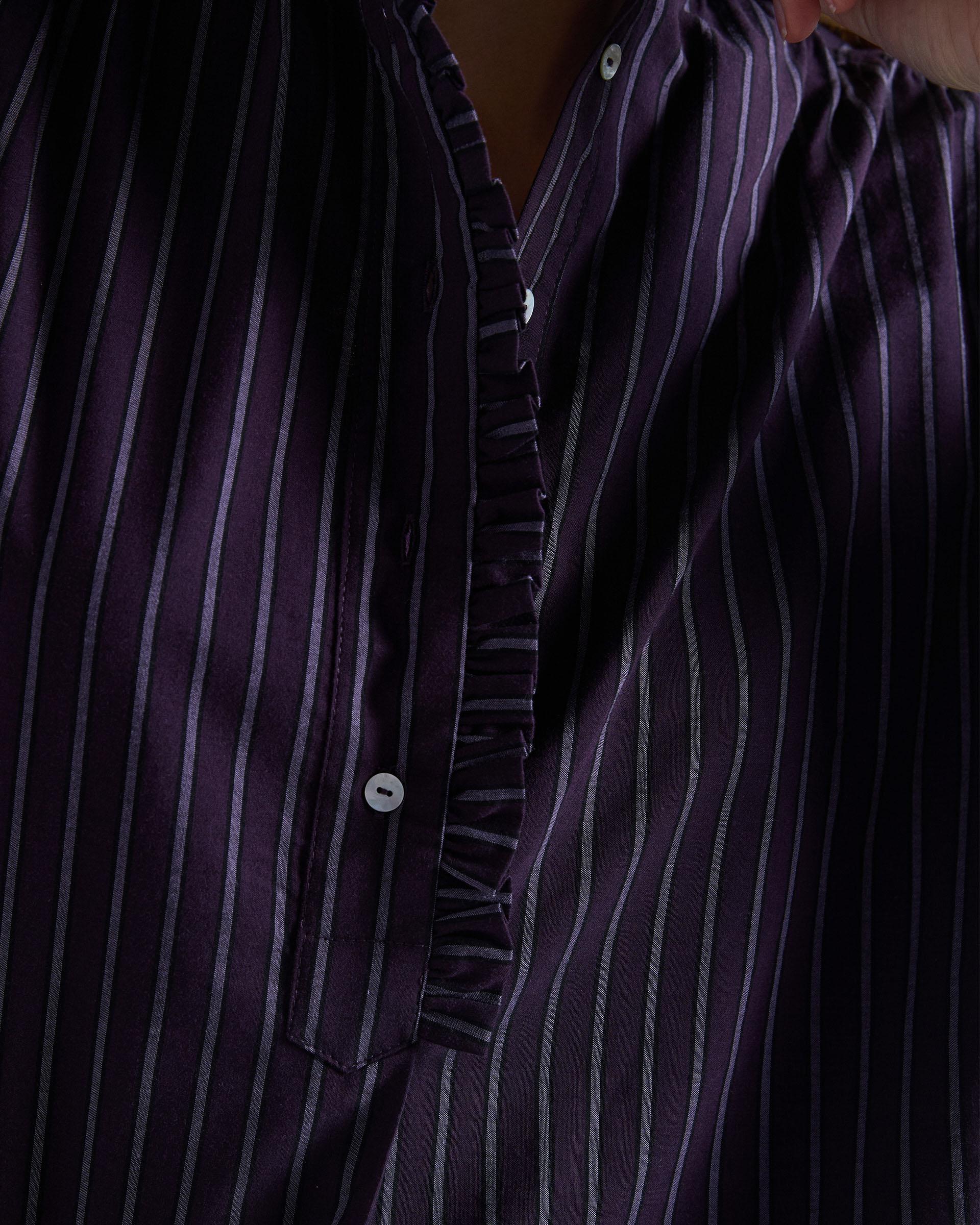 BLUSA RAYAS VOLANTE