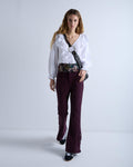 PANTALON COSTURAS BOTONES BAJO