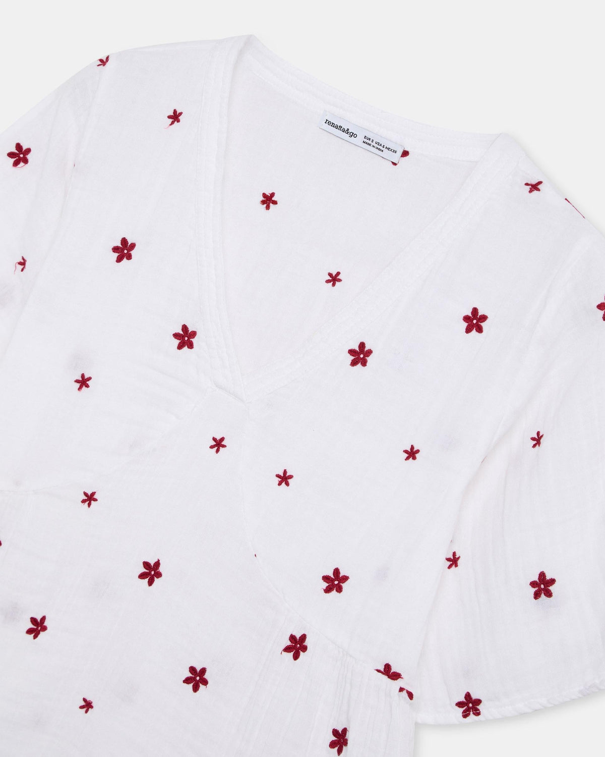 BLUSA ESCOTE EN V BORDADOS FLORALES