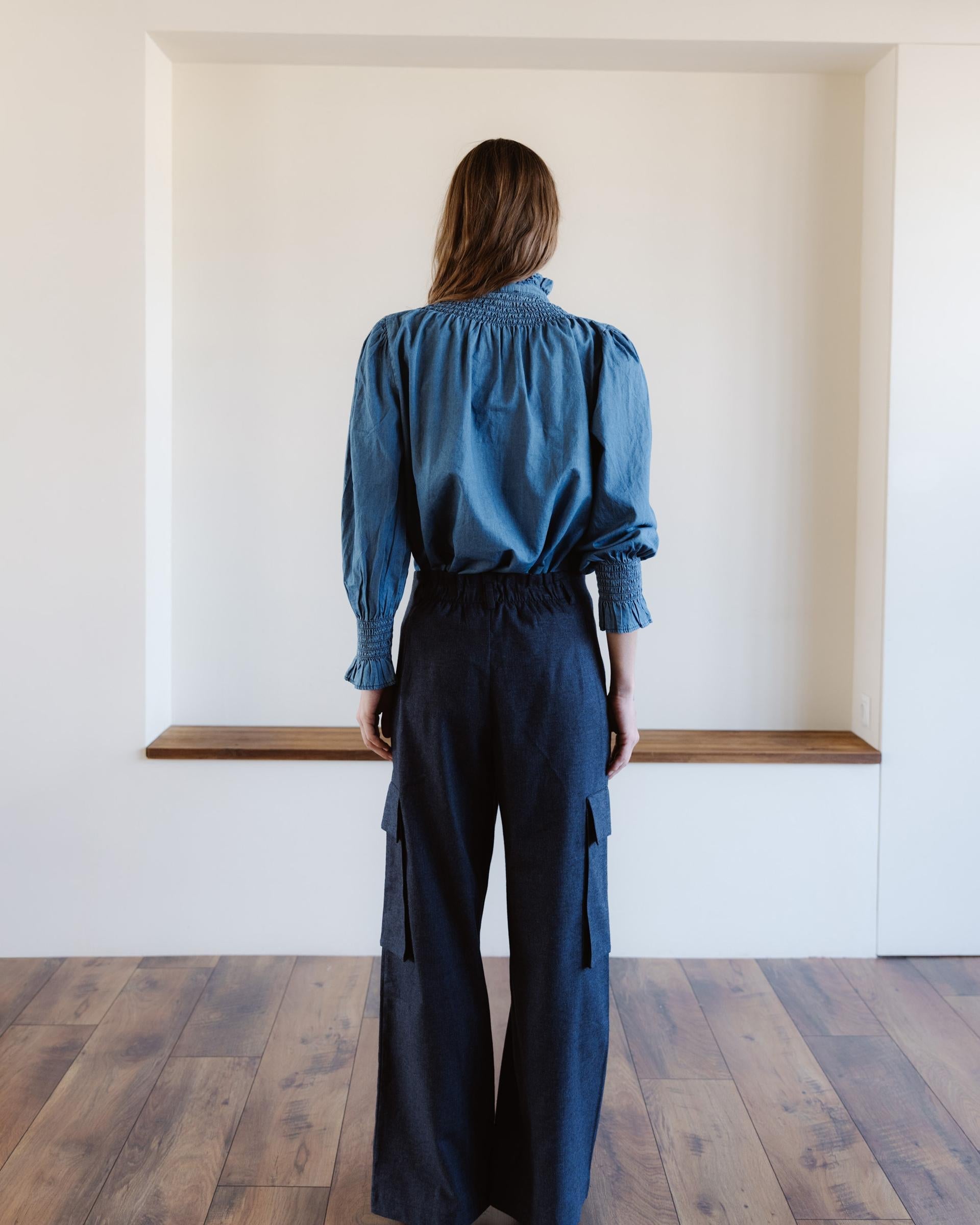 BLUSA CUELLO ALTO TIPO DENIM