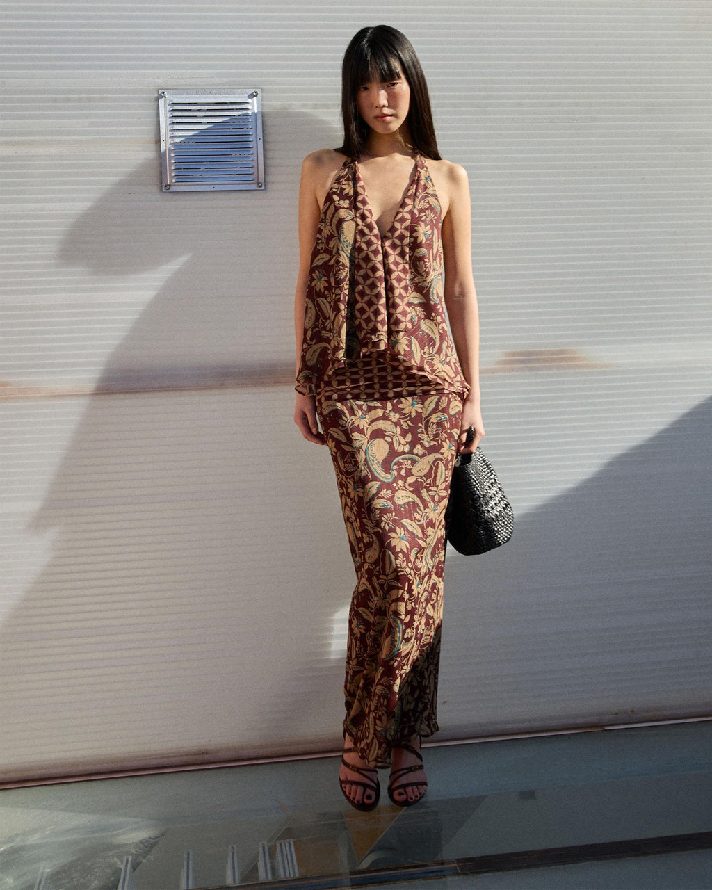 TOP EN V ESTAMPADO FLORAL Y GEOMETRICO