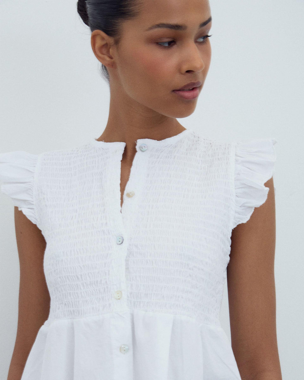 BLUSA NIDO DE ABEJA BOTONES DELANTERO