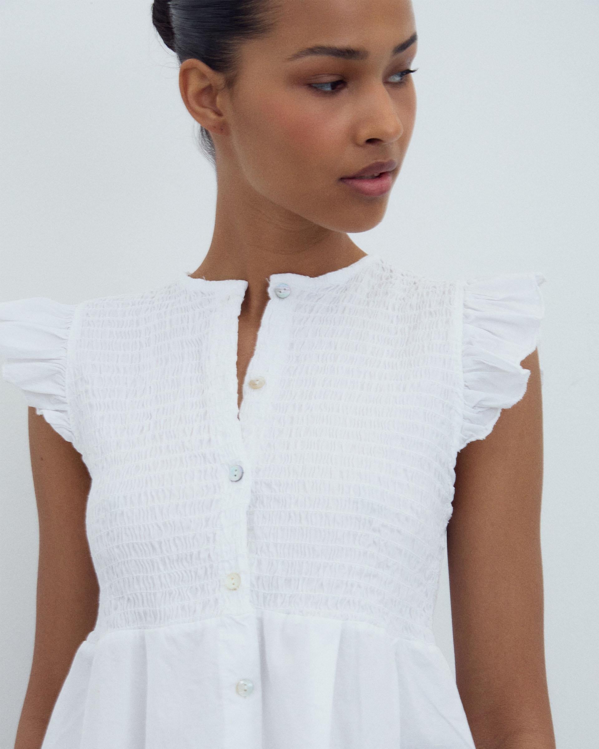 BLUSA NIDO DE ABEJA BOTONES DELANTERO