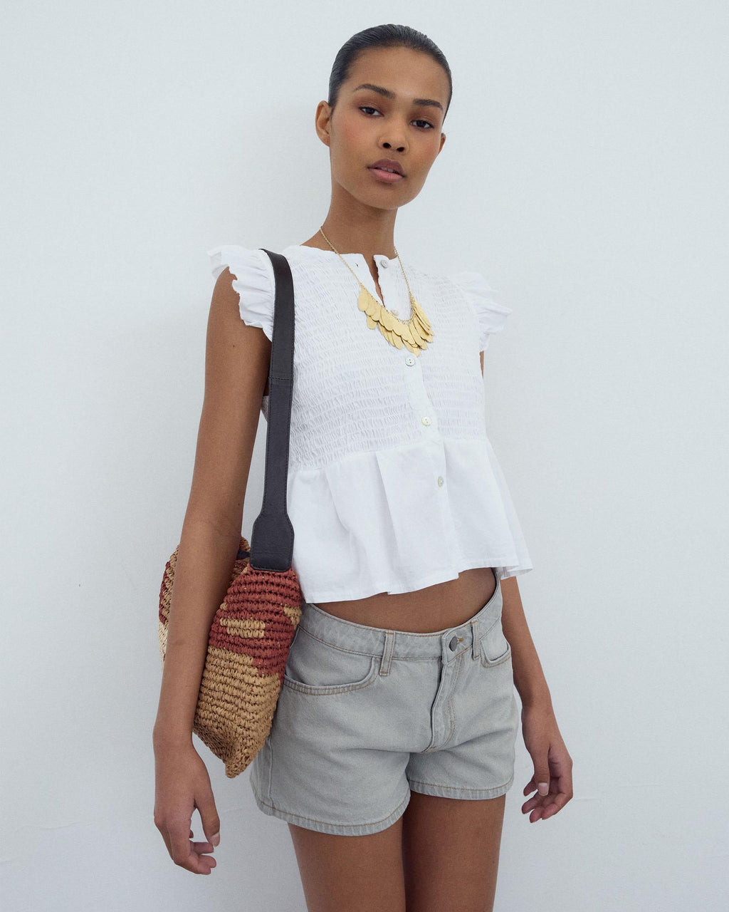 BLUSA NIDO DE ABEJA BOTONES DELANTERO