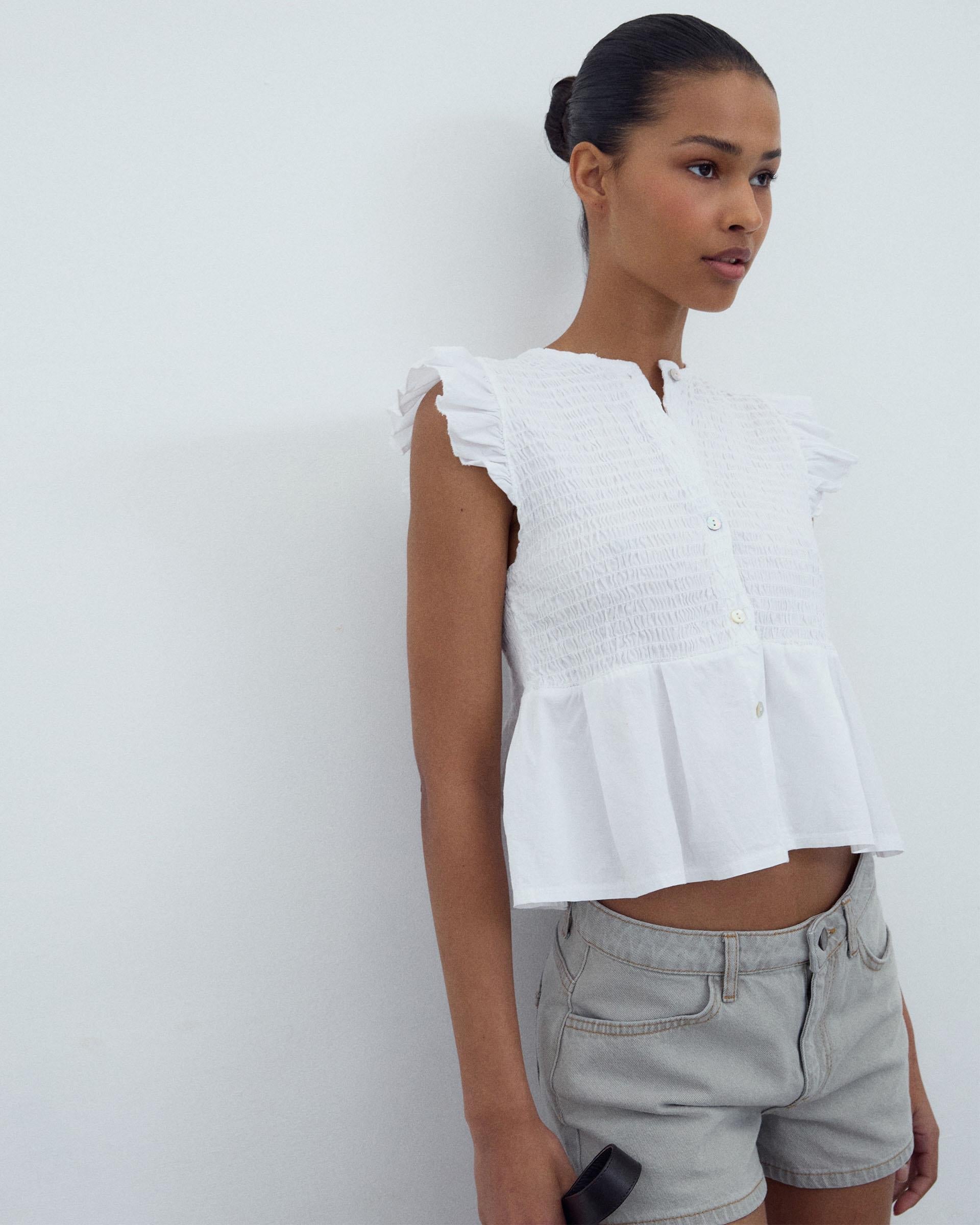 BLUSA NIDO DE ABEJA BOTONES DELANTERO