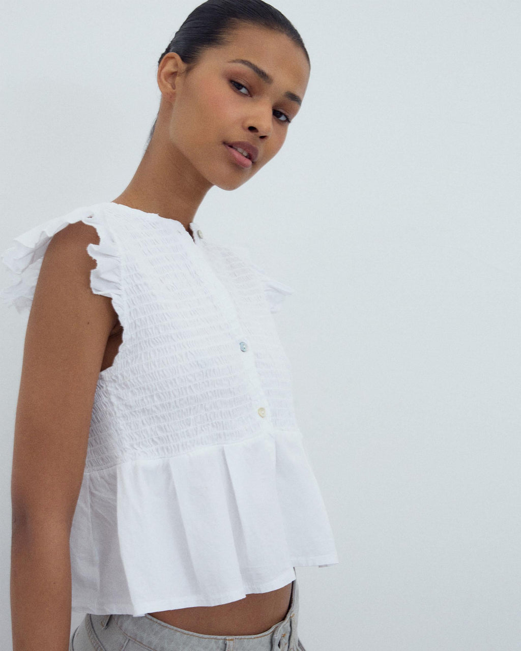 BLUSA NIDO DE ABEJA BOTONES DELANTERO