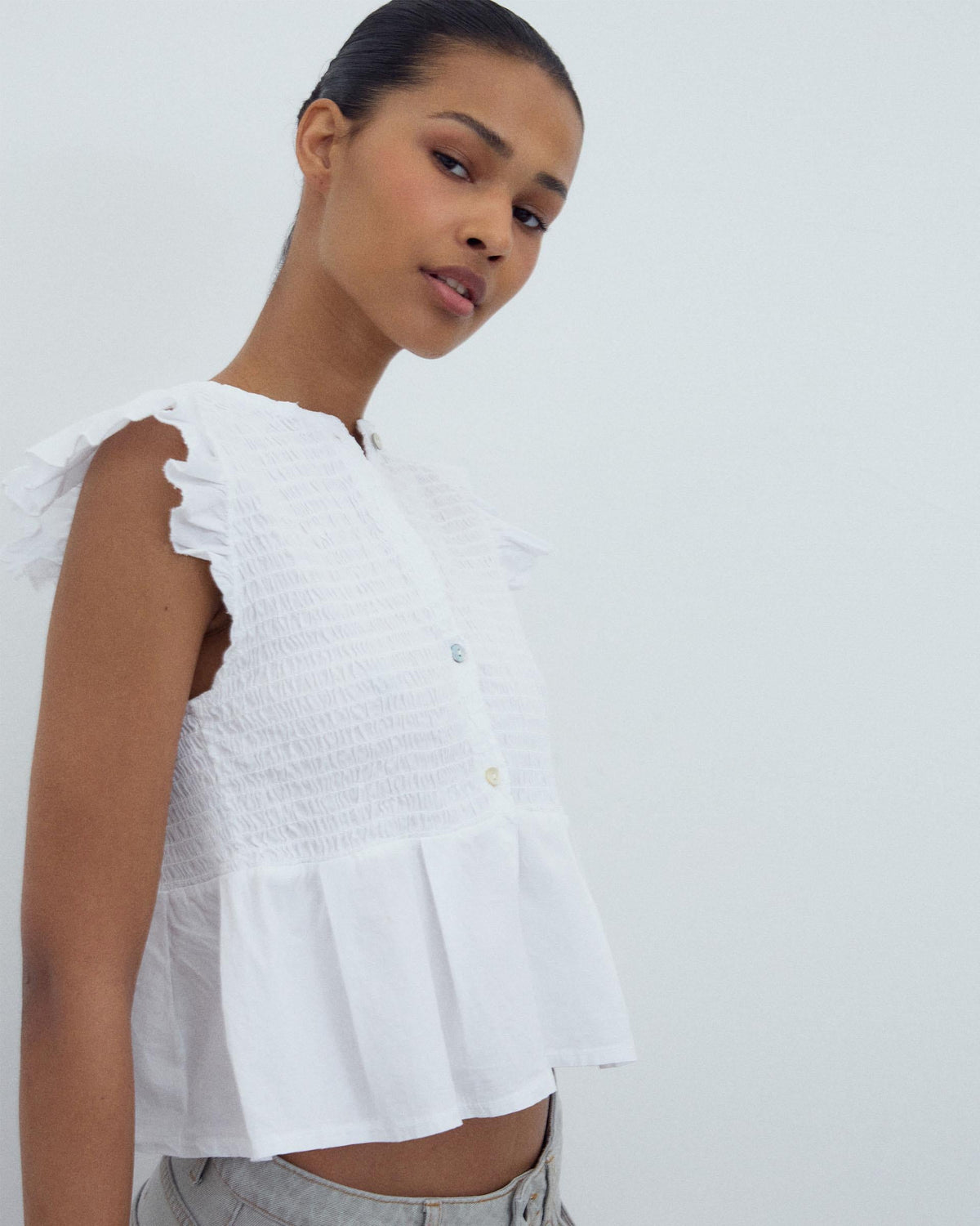 BLUSA NIDO DE ABEJA BOTONES DELANTERO