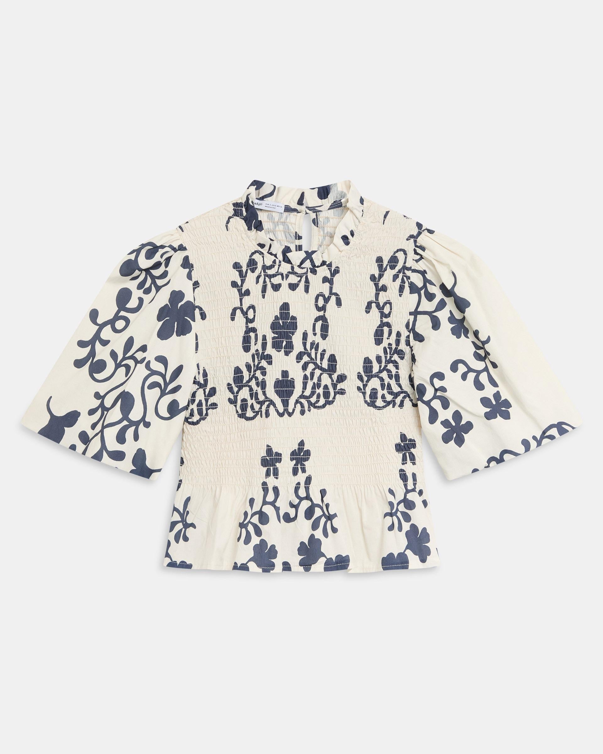 TOP NIDO DE ABEJA MANGA ABULLONADA ESTAMPADO