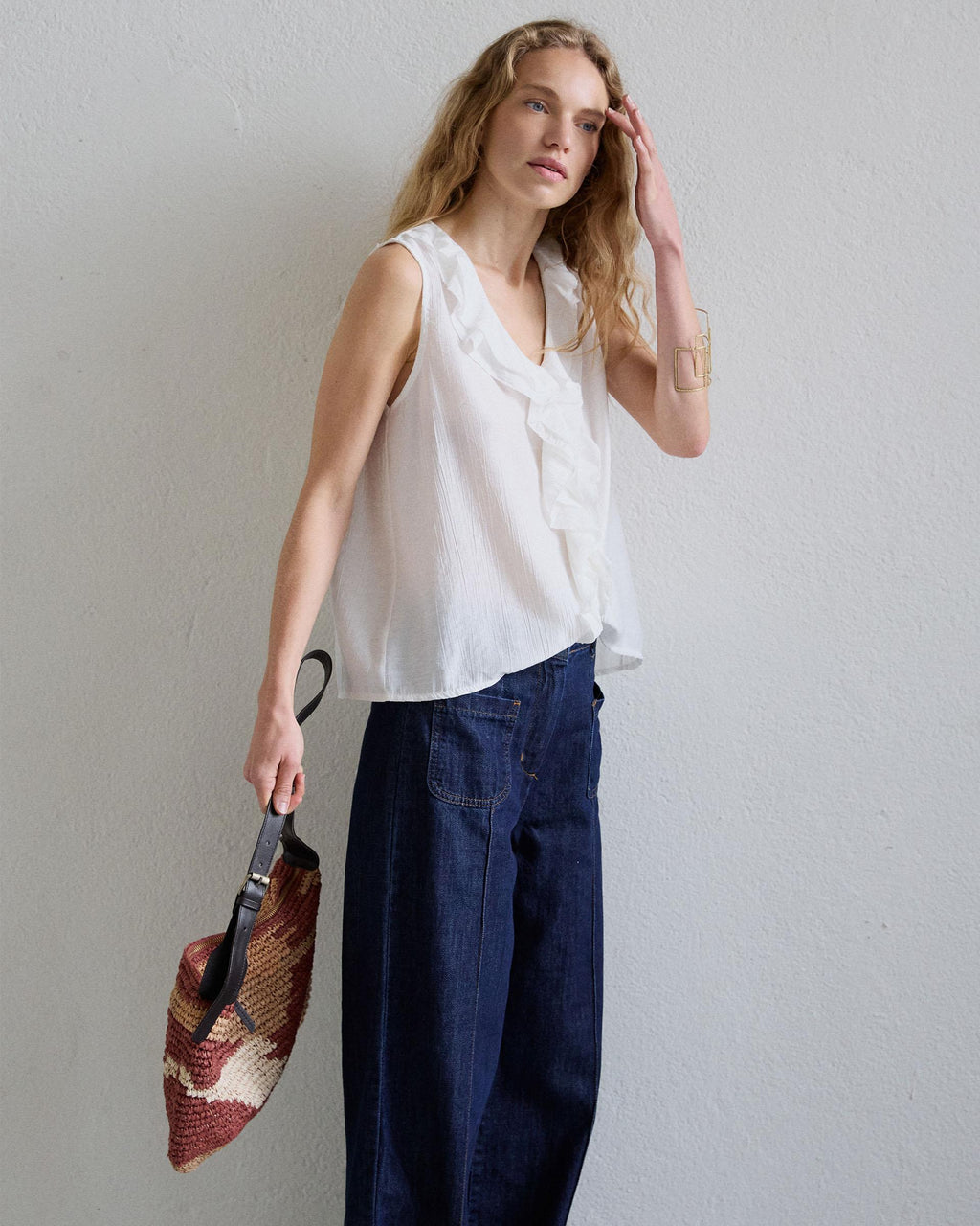 BLUSA SIN MANGAS VOLANTES ESCOTE V