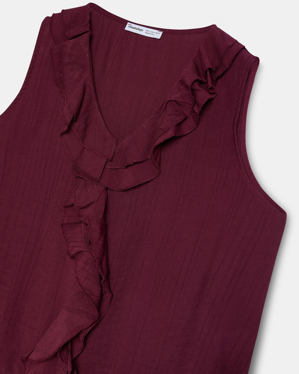 BLUSA SIN MANGAS VOLANTES ESCOTE V