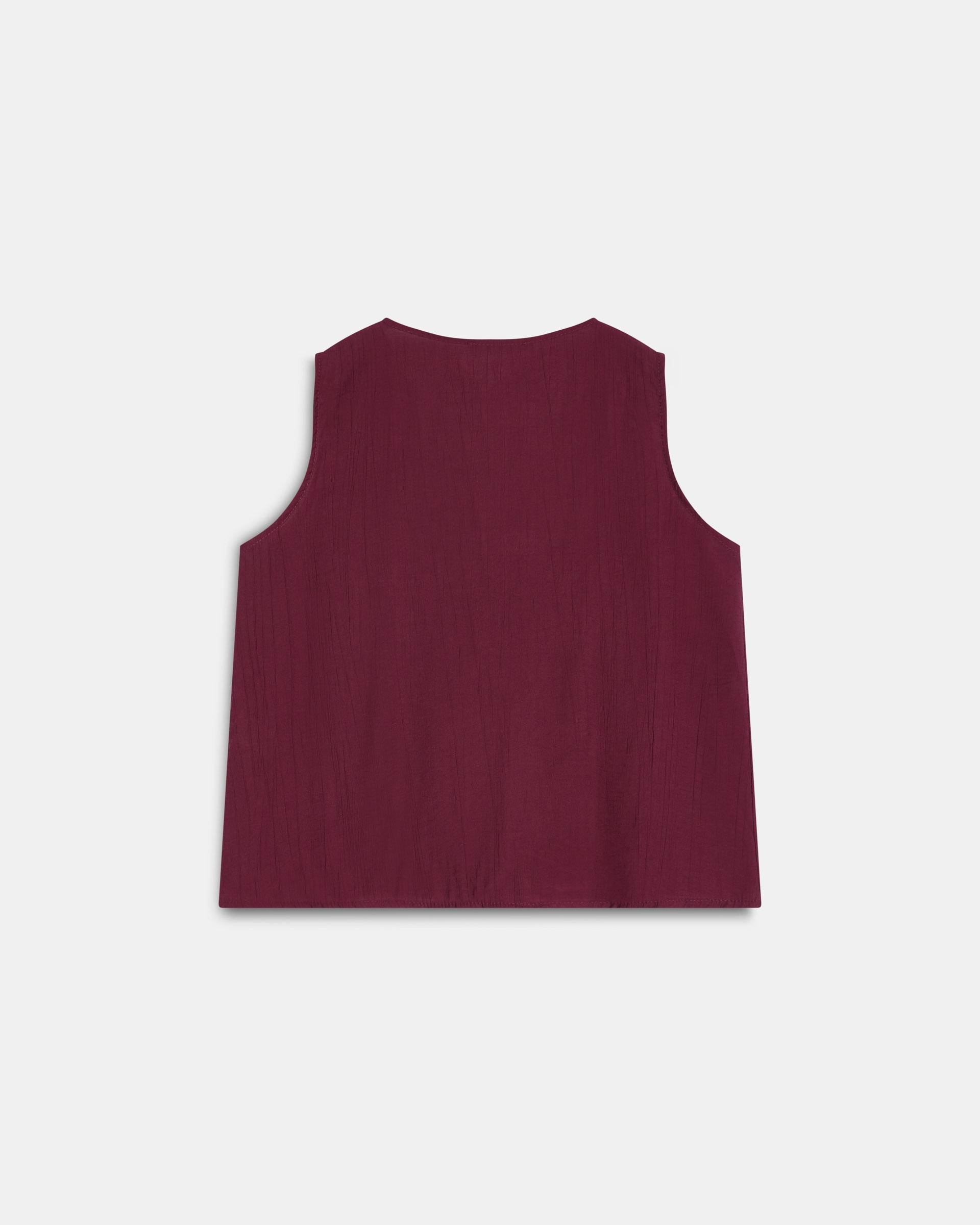BLUSA SIN MANGAS VOLANTES ESCOTE V