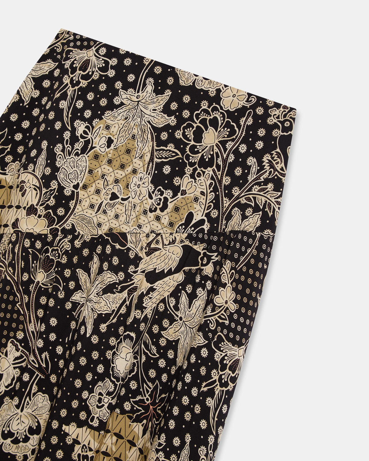 FALDA COSTURA DIAGONAL ESTAMPADO FLORAL