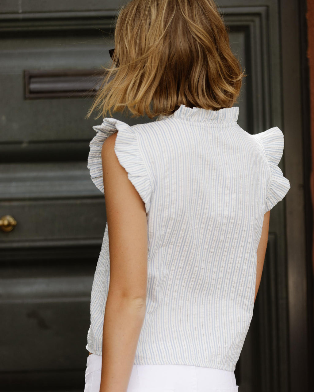 BLUSA SIN MANGAS VOLANTES RAYAS
