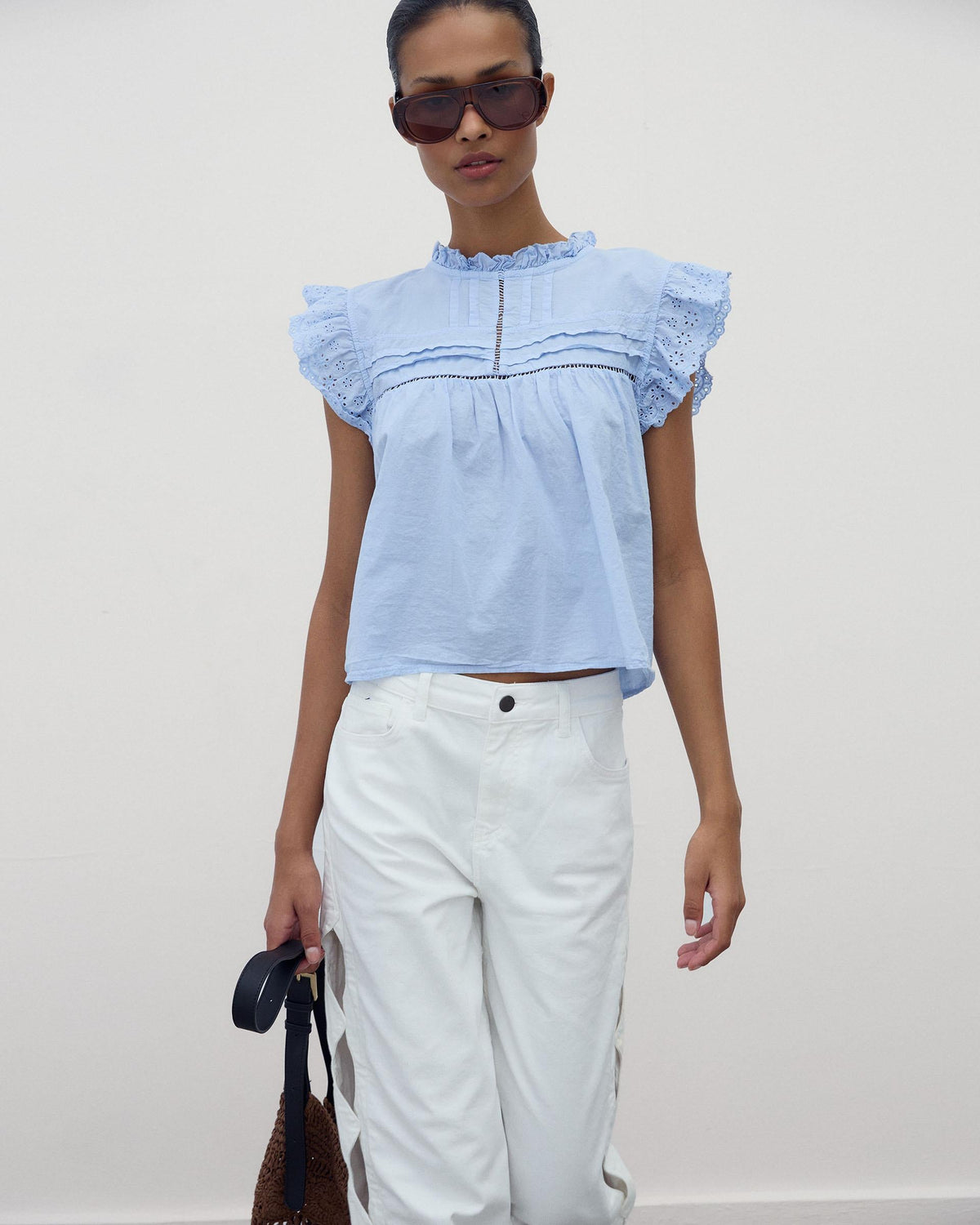 BLUSA MANGAS TROQUELADAS