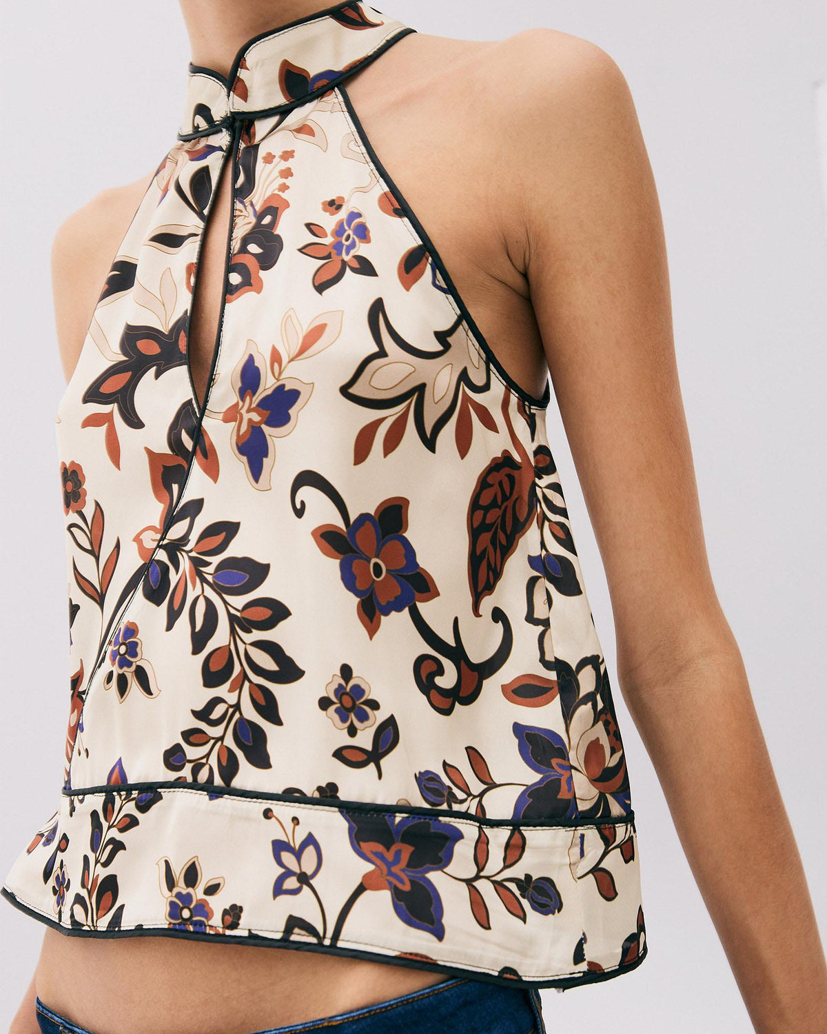 TOP CUELLO SUBIDO LAGRIMA ESTAMPADO FLORAL
